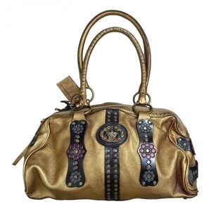 ISO this Anna Sui gold bag